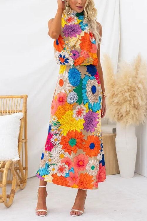 Zomer | Mouwloze maxi-jurk met strik en bloemenprint